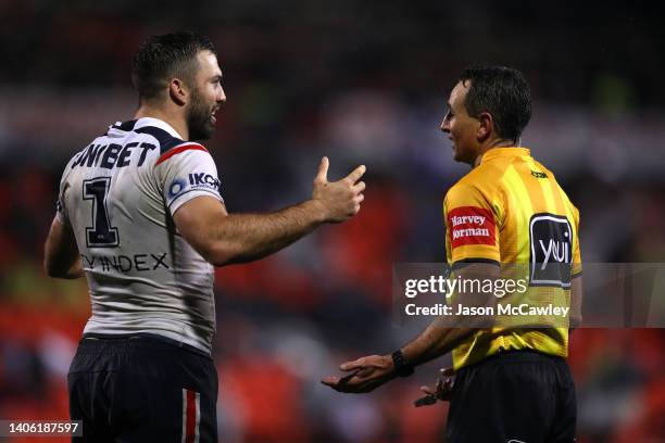 James Tedesco of the Roosters speaks to referee Gerard Sutton during the round 16 NRL match between the Penrith Panthers and the Sydney Roosters at...