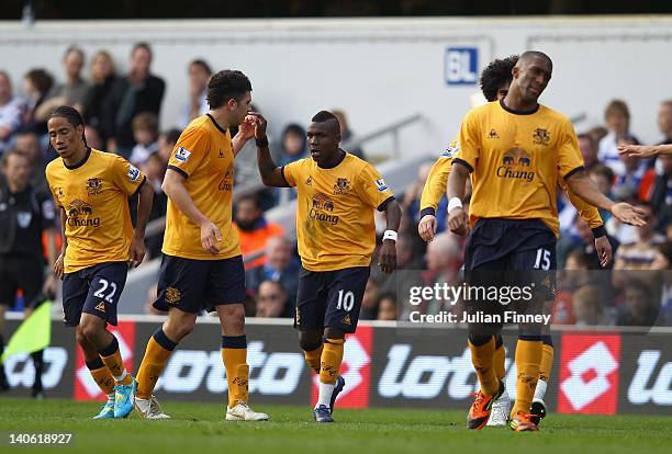 Royston Drenthe of Everton celebrates scoring his teams first goal during the Barclays Premier League match between Queens Park Rangers and Everton...