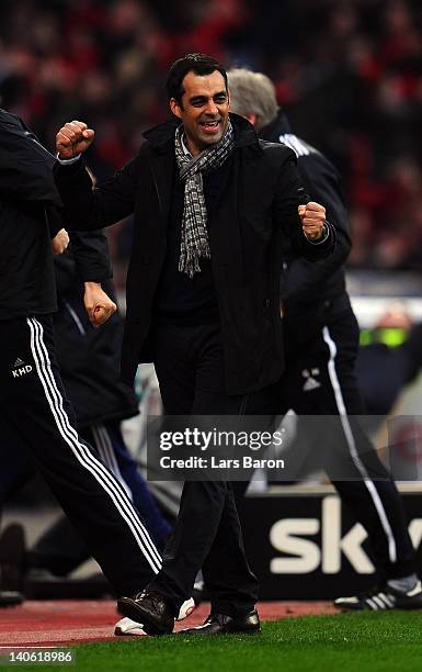 Head coach Robin Dutt of Leverkusen celebrates after Stefan Kiessling scored his teams first goal during the Bundesliga match between Bayer 04...