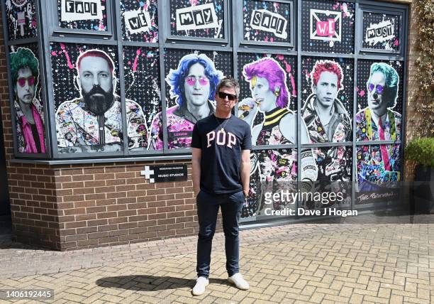 Noel Gallagher poses for a portrait as artists The Postman install a larger than life mural for Noel Gallagher at his North London Studio, London on...