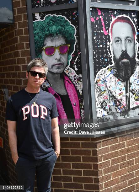 Noel Gallagher poses for a portrait as artists The Postman install a larger than life mural for Noel Gallagher at his North London Studio, London on...