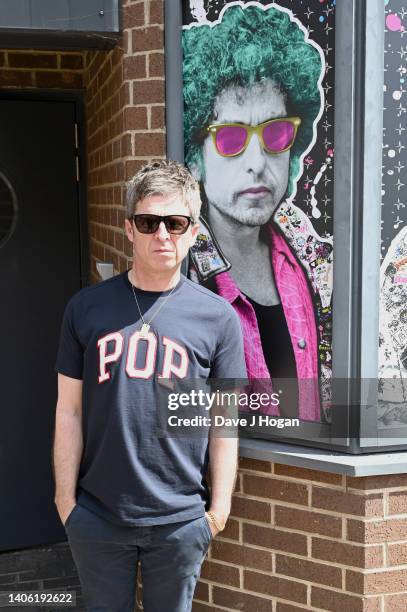 Noel Gallagher poses for a portrait as artists The Postman install a larger than life mural for Noel Gallagher at his North London Studio, London on...