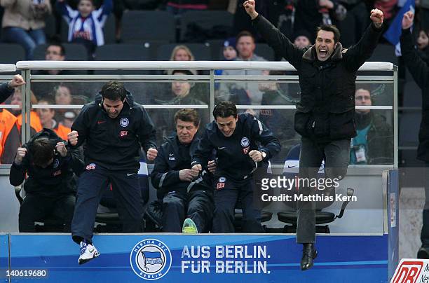 Assistant coach Rene Tretschok, head coach Otto Rehhagel, assistant coach Ante Covic and manager Michael Preetz jubilate after winning the Bundesliga...