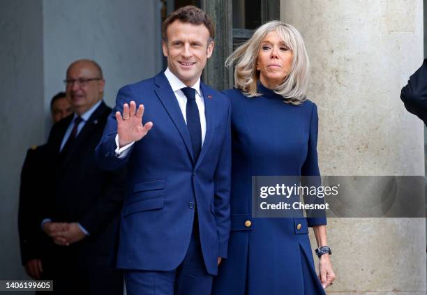 French President Emmanuel Macron and his wife Brigitte Macron wait for Australian Prime Minister Anthony Albanese and his spouse Jodie Haydon prior...