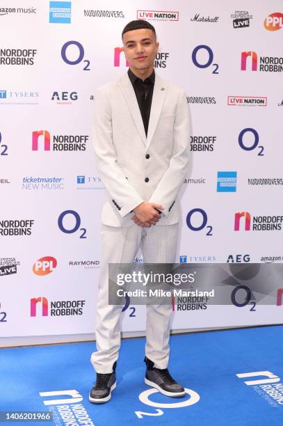 Junior Savva Andreas Andre attends the Nordoff Robbins O2 Silver Clef Awards at The Grosvenor House Hotel on July 01, 2022 in London, England.
