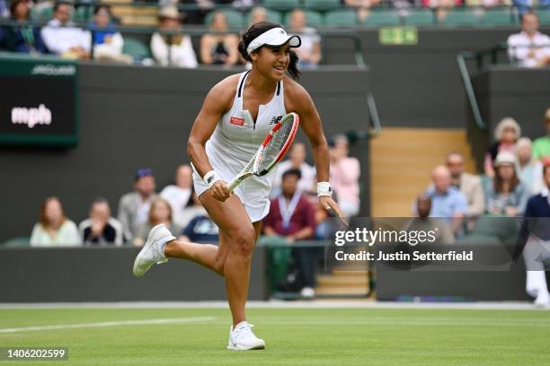 Heather Watson of Great Britain runs to play a shot against Kaja Juvan of Slovenia during their Women's Singles Third Round match on day five of The...