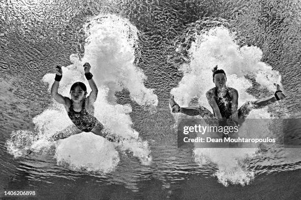 Image taken using an underwater camera and has been converted to black and white B&W.) Pandelela Pamg and Nur Dhabitah Sabri of Team Malaysia compete...