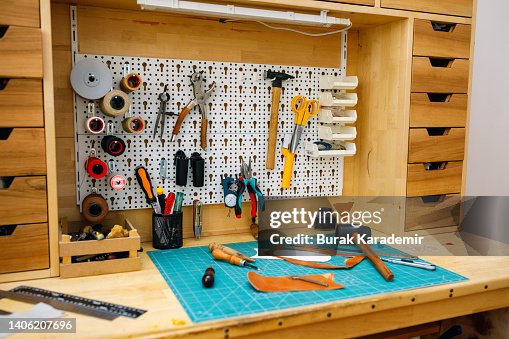 Leather crafting tools Leather smith's work desk work bench work tool in studio Leather crafting tools Leather smith's work desk work bench work tool in studio
