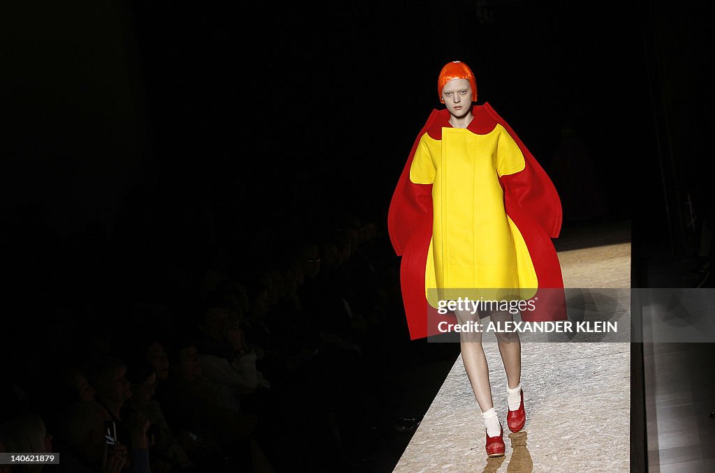 A model presents a creation by Comme des