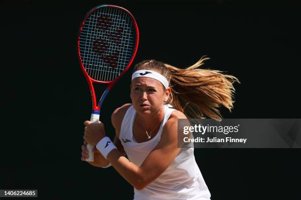 Marie Bouzkova of Czech Republic plays a backhand against Alison Riske-Amritraj of The United States during their Women's Singles Third Round match...