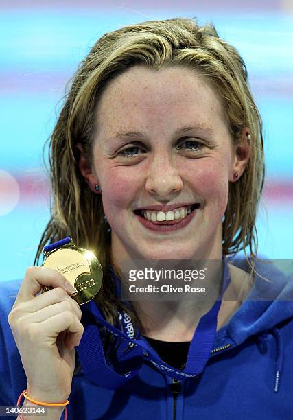 Hannah Miley of Garioch celebrates with the gold medal after winning the Women's Open 400m Individual Medley Final during day one of the British Gas...