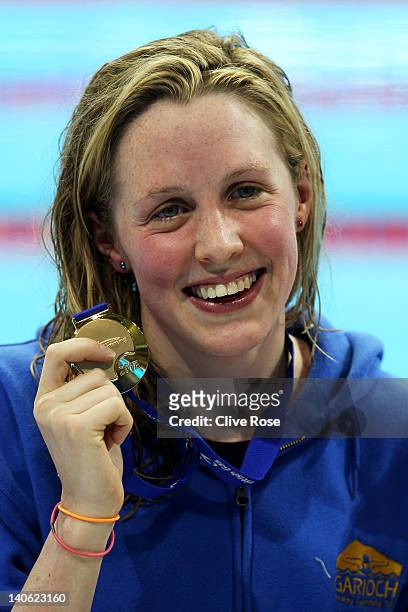 Hannah Miley of Garioch celebrates with the gold medal after winning the Women's Open 400m Individual Medley Final during day one of the British Gas...