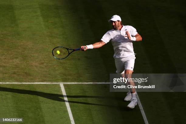 Steve Johnson of The United States plays a forehand against Cameron Norrie of Great Britain during their Men's Singles Third Round match on day five...