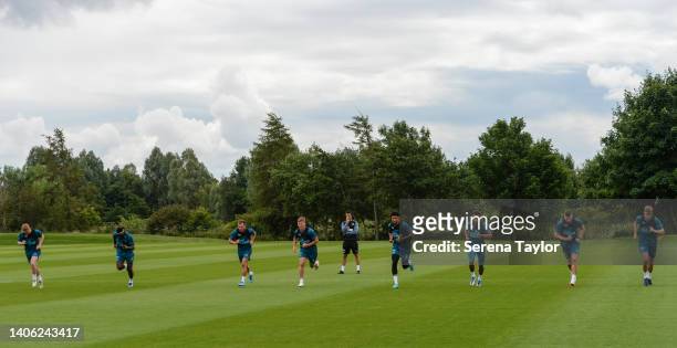 Players undergo a bleep test during the Newcastle United Training Session at the Newcastle United Training Centre on July 01, 2022 in Newcastle upon...