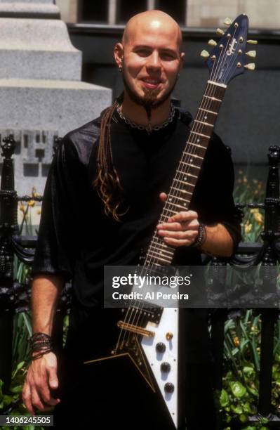 Guitarist C.J. Pierce of the band Drowning Pool appears in a portrait with his Gibson Flying V model guitar on May 10, 2001 in the Flatiron District...