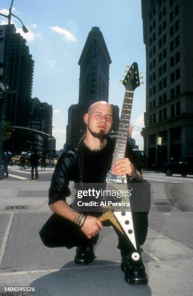 Guitarist C.J. Pierce of the band Drowning Pool appears in a portrait with his Gibson Flying V model guitar on May 10, 2001 in the Flatiron District...