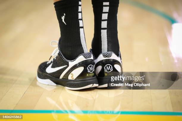 Shoes worn by Liz Cambage of the Los Angeles Sparks recognize Kobe and Gigi Bryant before the game against the Washington Mystics at Crypto.com Arena...