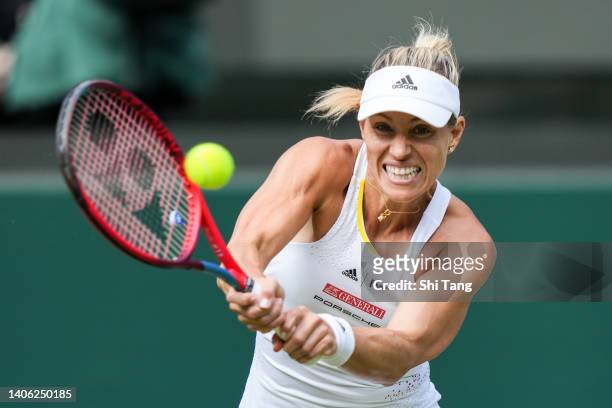 Angelique Kerber of Germany plays a backhand in the Women's Singles Third Round Match against Elise Mertens of Belgium during day five of The...