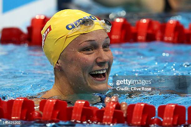 Sarah Sjoestroem of Sweden smiles after the Women's 100m Butterfly Guest Final during day one of the British Gas Swimming Championships at the London...