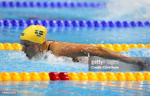 Sarah Sjoestroem of Sweden competes in the Women's 100m Butterfly Guest Final during day one of the British Gas Swimming Championships at the London...