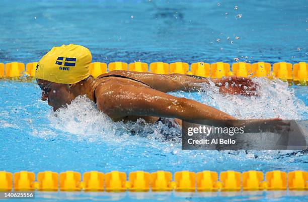 Sarah Sjoestroem of Sweden competes in the Women's 100m Butterfly Guest Final during day one of the British Gas Swimming Championships at the London...