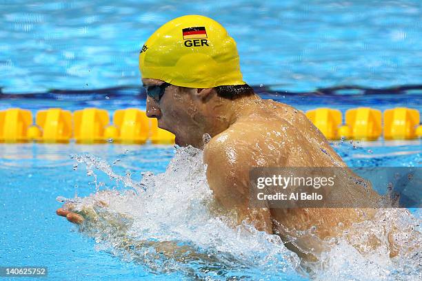 Hendrik Feldwehr of Germany competes in the Men's 100m Breaststroke Guest Final during day one of the British Gas Swimming Championships at the...