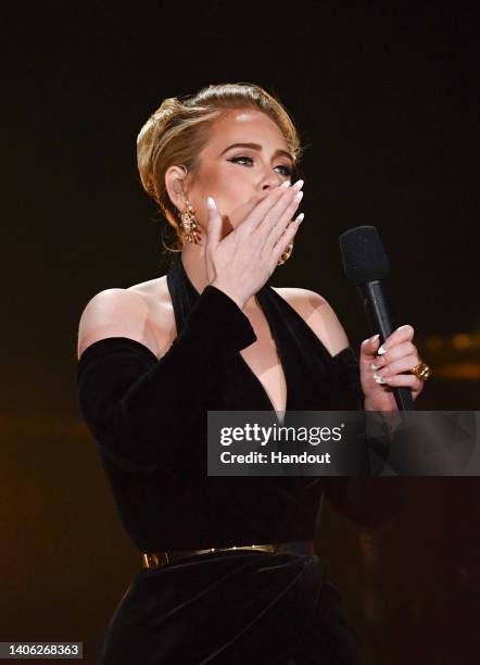 In this handout photo issued by Getty Images, Adele performs on stage as American Express present BST Hyde Park in Hyde Park on July 01, 2022 in...