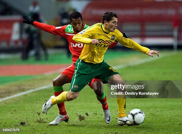 Maicon of FC Lokomotiv Moscow battles for the ball with Maksim Zhavnerchik of FC Kuban Krasnodar during the Russian Football League Championship...