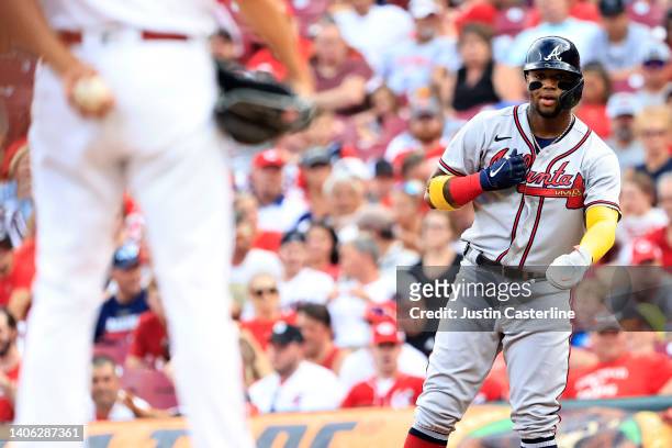 Ronald Acuna Jr. #13 of the Atlanta Braves at first base during the third inning in the game against the Cincinnati Reds at Great American Ball Park...
