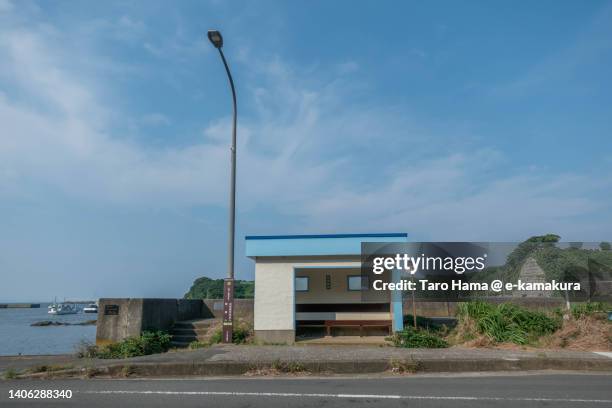 the bus stop by the beach in kanagawa of japan - kanagawa prefecture stock pictures, royalty-free photos & images