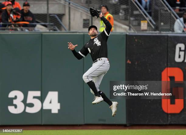 Pollock of the Chicago White Sox makes a leaping catch taking a hit away from Austin Wynns of the San Francisco Giants in the bottom of the second...