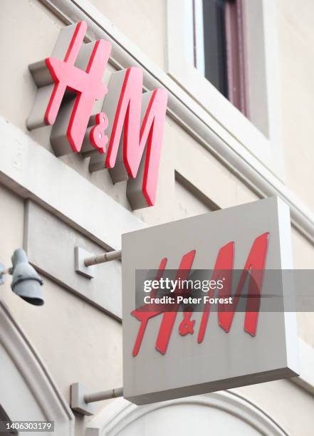 The H&M logo is on display in front of the store during the Multi-City Buy From a Black Woman Inspire Tour at the H&M French Quarter Store on July 1,...