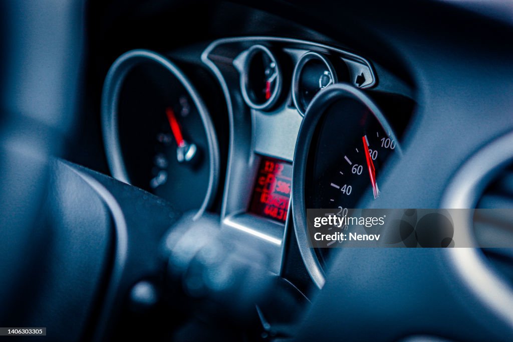 Dashboard Instruments Displaying Various Car And Engine Conditions