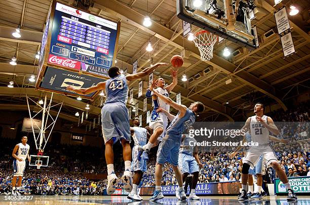 Austin Rivers of the Duke Blue Devils drives to the basket against the North Carolina Tar Heels during their game at Cameron Indoor Stadium on March...