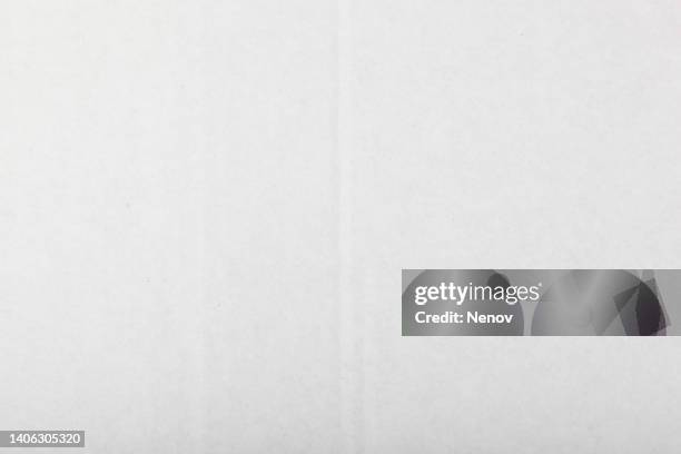 close-up of white cardboard paper texture - white color photos stock pictures, royalty-free photos & images