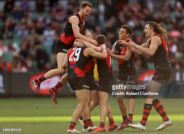 Jake Kelly of the Bombers celebrates after scoring a goal during the round 16 AFL match between the Essendon Bombers and the Sydney Swans at...