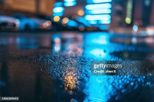 asphalt road after rain - polished concrete floor stock pictures, royalty-free photos & images