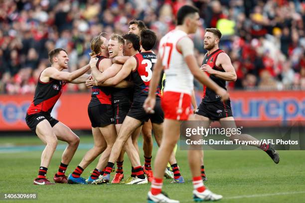 Nick Hind of the Bombers celebrates a goal during the round 16 AFL match between the Essendon Bombers and the Sydney Swans at Melbourne Cricket...