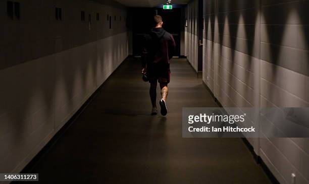 Adam Reynolds of the Broncos walks back to the dressing room after speaking to the media before the start of the round 16 NRL match between the North...