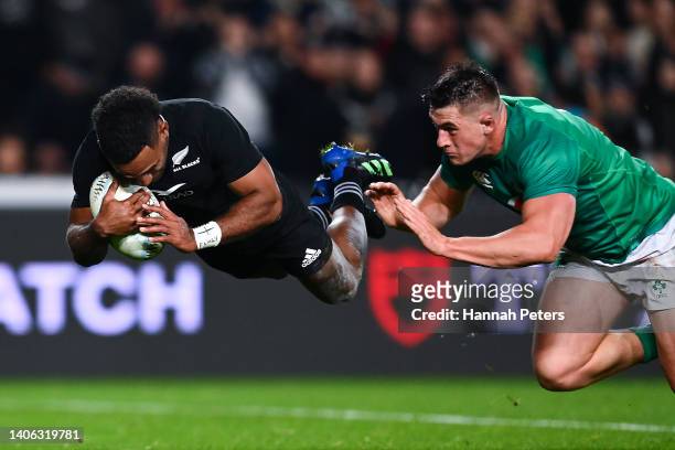 Sevu Reece of New Zealand scores a try during the International test Match in the series between the New Zealand All Blacks and Ireland at Eden Park...