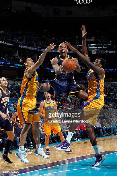 Dahntay Jones of the Indiana Pacers goes to the basket against the New Orleans Hornets on March 3, 2012 at the New Orleans Arena in New Orleans,...