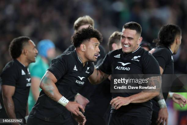 Ardie Savea is congratulated on scoring a try by Codie Taylor of New Zealand during the International test Match in the series between the New...