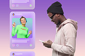 Side view of african american phone user scrolling news feed of social media on purple background