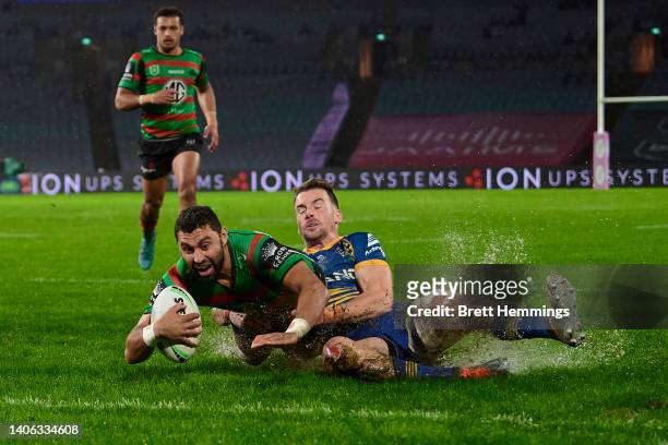 Alex Johnston of the Rabbitohs scores a try during the round 16 NRL match between the South Sydney Rabbitohs and the Parramatta Eels at Stadium...