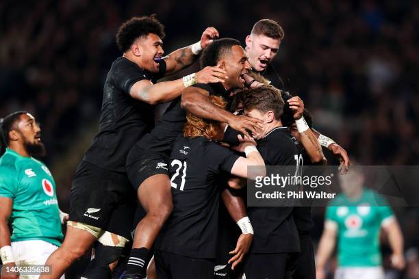 Pita Gus Sowakula of New Zealand celebrates with teammates after scoring a try during the International test Match in the series between the New...