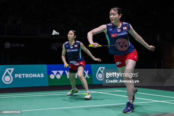 Mayu Matsumoto and Wakana Nagahara of Japan compete in the Women's Doubles Semi Finals match against Zhang Shu Xian and Zheng Yu of China on day five...