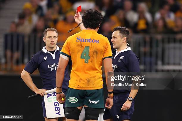 Referee James Doleman shows Darcy Swain of the Wallabies a red card during game one of the international test match series between the Australian...