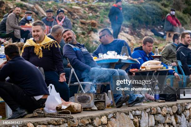 group of men enjoying bbq at festival area - aegean turkey stock pictures, royalty-free photos & images