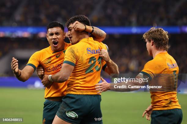 Jordan Petaia of the Wallabies celebrates scoring a try with team mates during game one of the international test match series between the Australian...