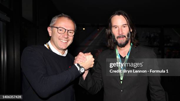 Stefano Domenicali, CEO of the Formula One Group, meets Keanu Reeves after final practice ahead of the F1 Grand Prix of Great Britain at Silverstone...